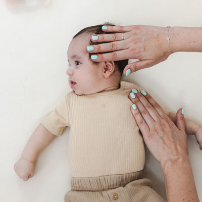 signs of torticollis in babies